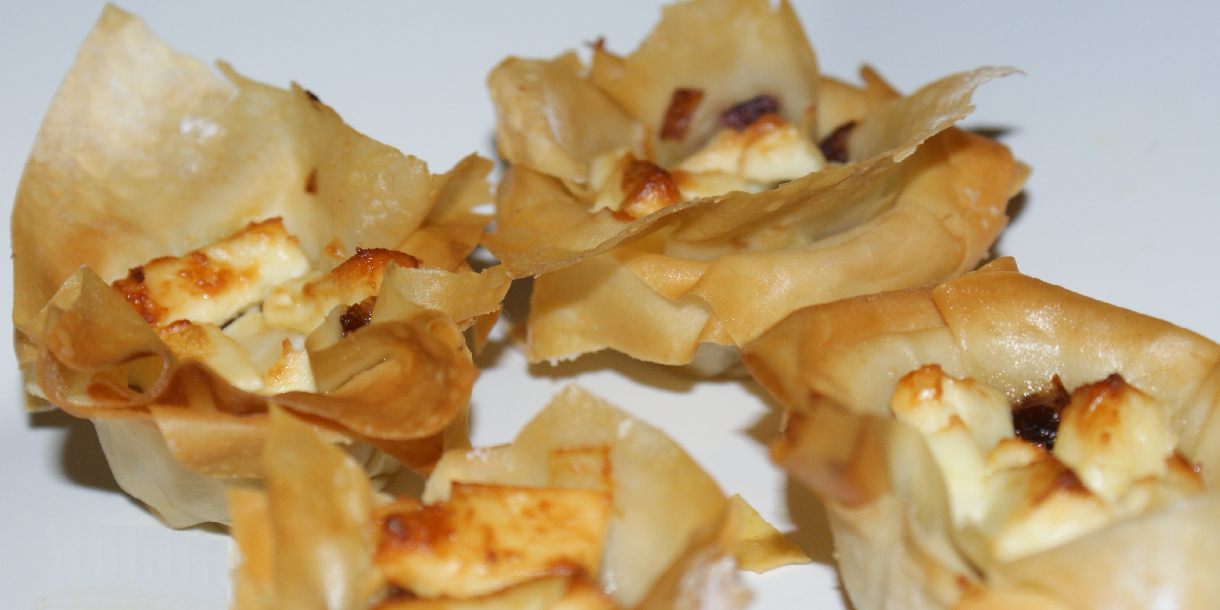 Filo red oinion & feta cheese tarts
	 Finger Food for the epicure